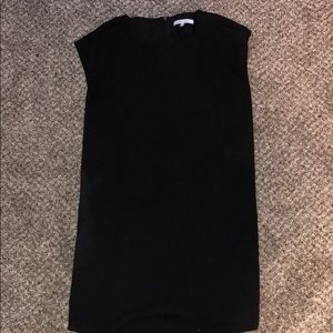 Black dress with gold zippers on side